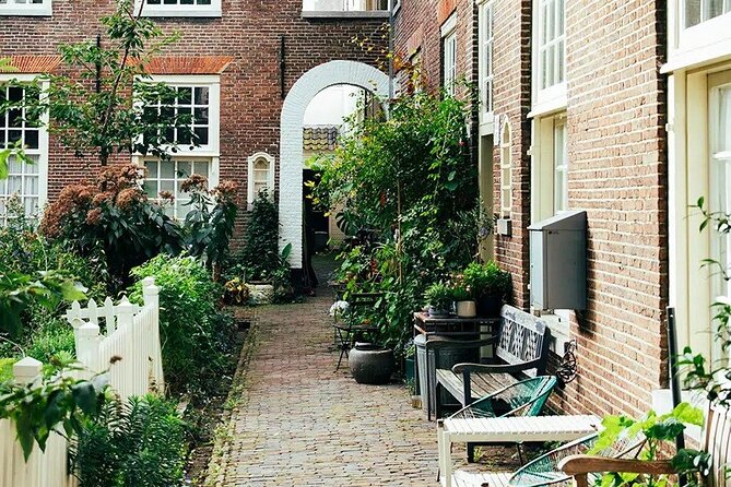 Amsterdam High-End Dutch Food & History Tour - Up to 8 guests - Tuesday through Friday: sausage, cheese, seafood, and wine