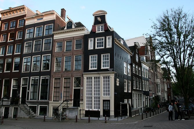 Amsterdam Highlights Walking Tour: Small Group Experience - Jordaan, galleries, and optional route choices