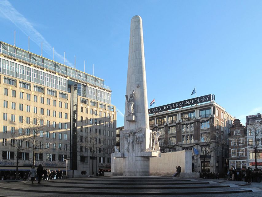 Amsterdam: Historic Walking Tour - Starting at Damrak 1 and entering old Amsterdam