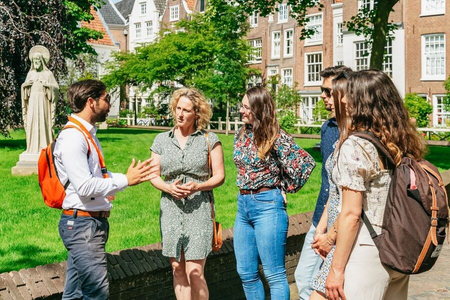 Amsterdam: Historical Highlights Walking Tour with Tasting - Finishing by the Amstel River