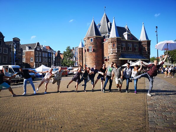 Amsterdam Introductory Walking Tour with a Local - Starting beneath the National Monument in Dam Square