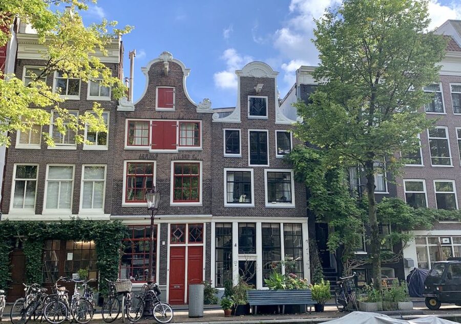 Amsterdam: Jordaan District Tour with a German guide - The canal belt and Amsterdam’s 400-year plan