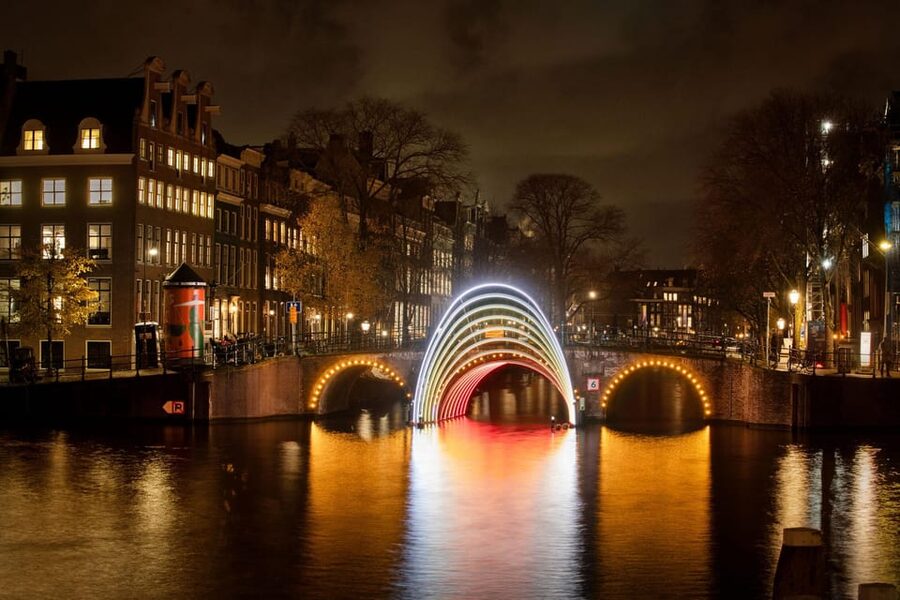 Amsterdam: Light Festival Boat Tour with Warm Drinks - Boarding the boat and settling in