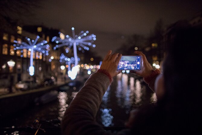 Amsterdam Light Festival: Canal Cruise + Bite & Unlimited Drinks - Seeing Amsterdam’s Light Festival from the water