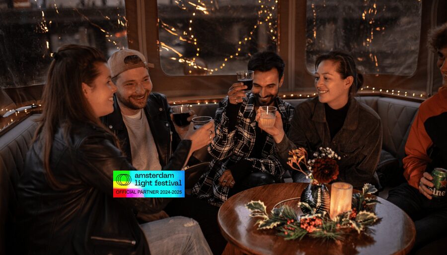 Amsterdam: Light Festival Cruise With Drinks & Snacks - What the covered boat adds to the experience