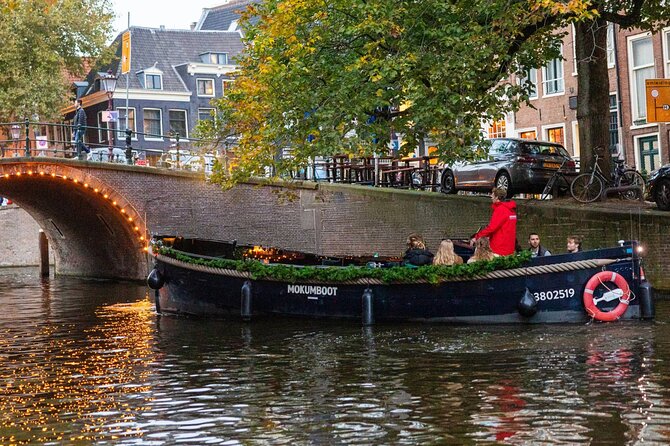 Amsterdam: Light Festival Open Boat - Unl. Drinks Option - The Magere Brug and its many tales