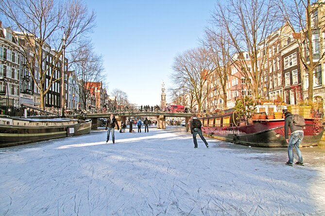 Amsterdam Light Festival Winter Walk with Stroopwafel Workshop - What this two-hour Amsterdam walk really offers