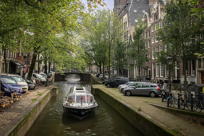 Amsterdam Live Guided Sightseeing Canal Cruise - Live narration, drinks, and the cold