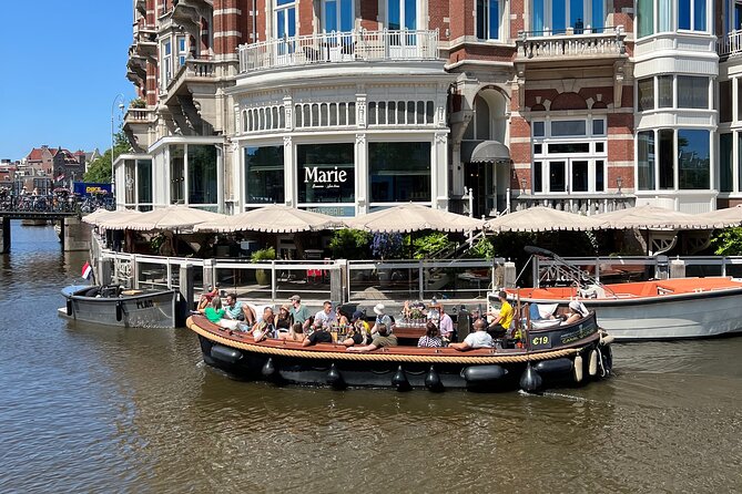 Amsterdam Luxury Boutique Boat tour with Unlimited Beer and Wine - Magere Brug, the Skinny Bridge