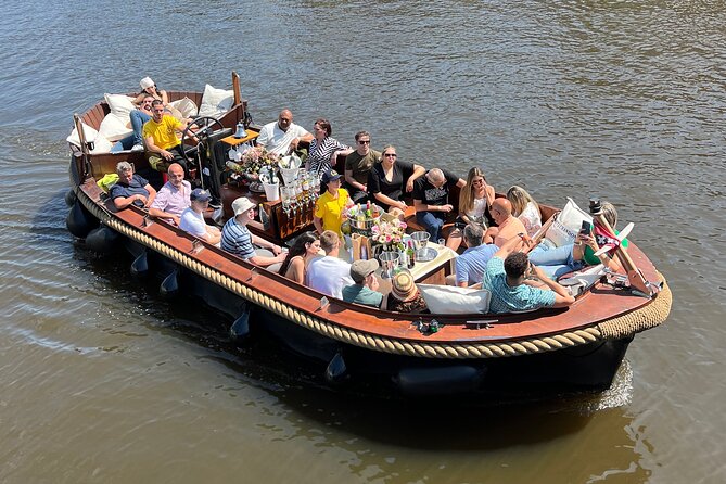 Amsterdam Luxury Boutique Boat tour with Unlimited Beer and Wine - Open or covered boat: choose your expectations