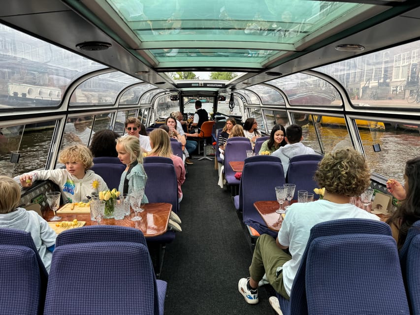 Amsterdam: Luxury Cheese & Wine Canal Cruise - Timing, delays, and the one-hour schedule