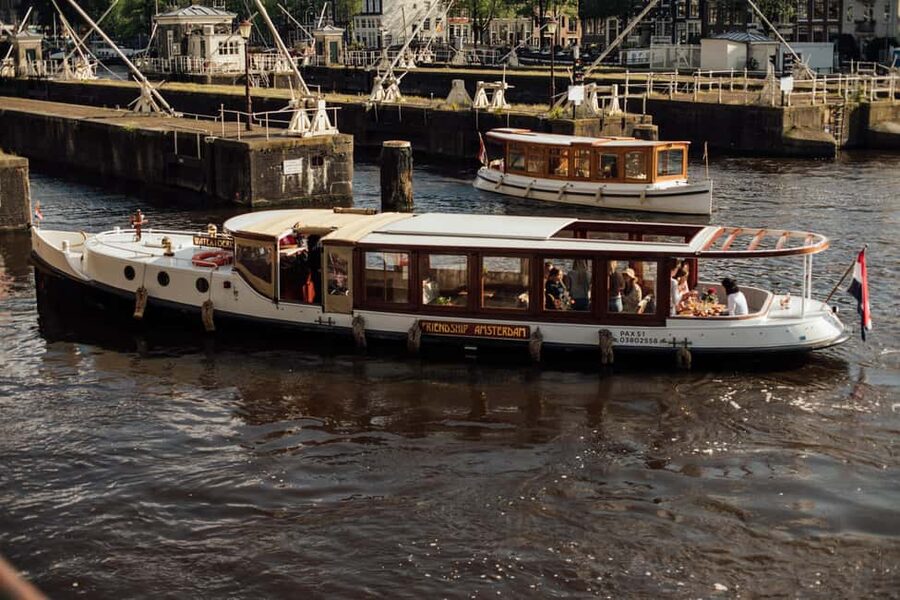 Amsterdam: Luxury Cruise Unlimited Cocktails & Snacks Option - The route from the Red Light District to the Amstel