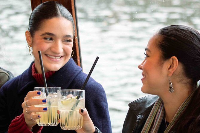 Amsterdam: Luxury Saloon Boat Cruise with Cocktails & Waffle - Kolksluice, Central Station, and the old waterfront