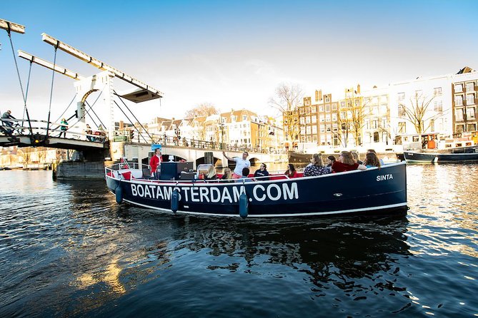 Amsterdam Open Boat Cruise in Old City Center with Live Guide - Starting at Amstel 51F by the Hermitage Museum