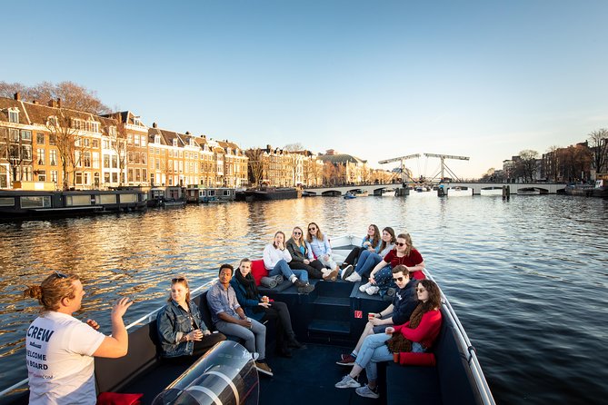 Amsterdam Open Boat Cruise with Live Guide and Two Drinks - What the one-hour route can show you