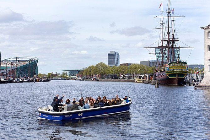 Amsterdam Open Boat Sightseeing Canal Cruise - NEMO, Amsterdam Centraal, and the modern city
