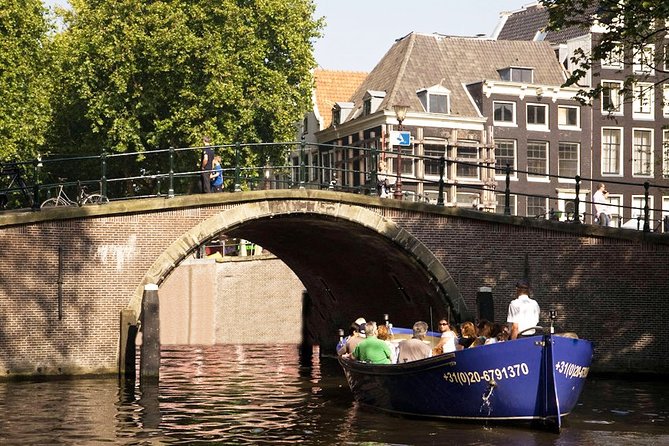 Amsterdam Open Boat Sightseeing Canal Cruise - Timing, rain, and the best time of day