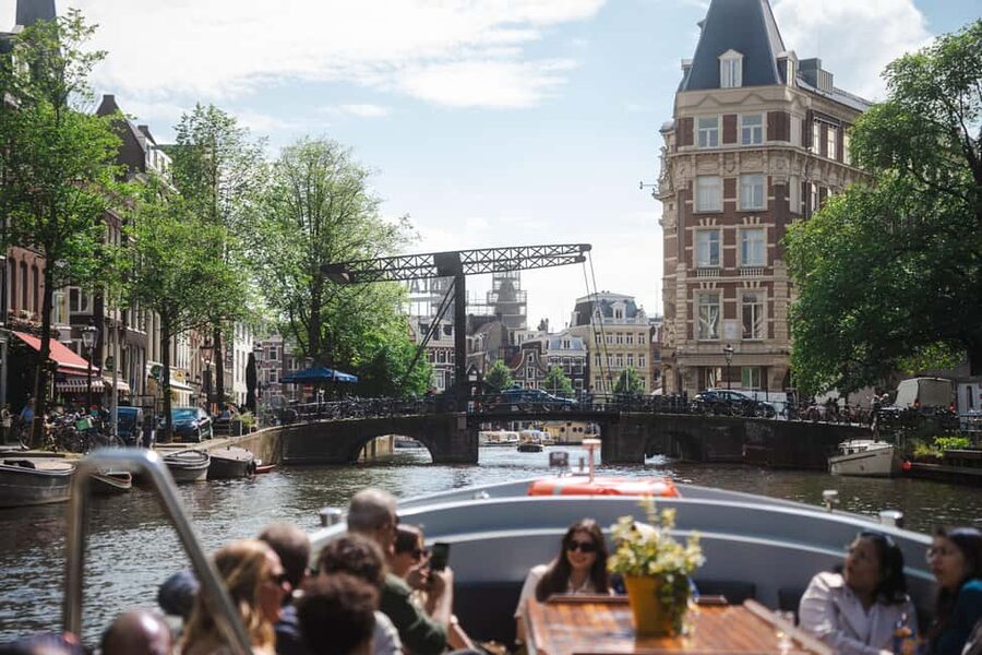 Amsterdam: Open Boat Tour of Canals with Expert Local Guide - Who will enjoy this cruise most?
