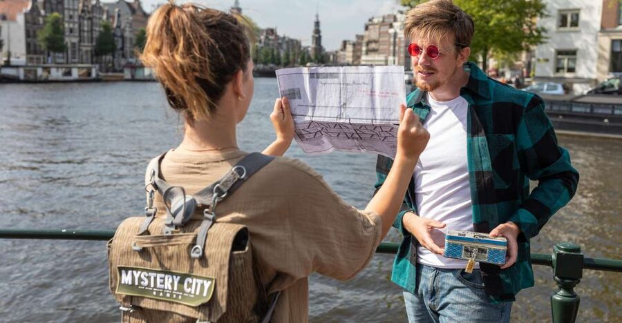 Amsterdam: "Operation 45 " Treasure Hunt Walking Tour - Starting at the Mystery City Games headquarters