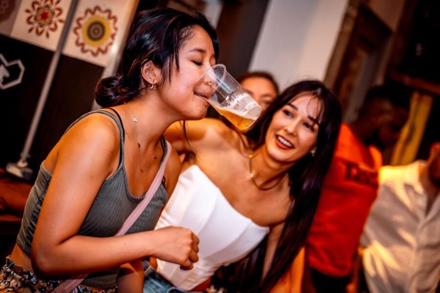 Amsterdam: Original Pub Crawl Party with VIP Entrance - Moving through Amsterdam after dark