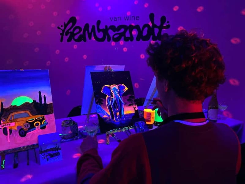 Amsterdam: Paint and Sip in the Dark at Rembrandt van Wine - The neon painting format suits beginners