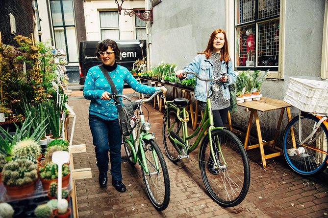 Amsterdam PRIVATE Bike Tour With Locals: Bike & Local Snack Included - The Magere Brug over the Amstel