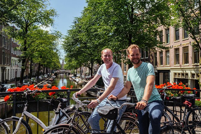 Amsterdam PRIVATE Bike Tour With Locals: Bike & Local Snack Included - The local snack and the value of a private guide