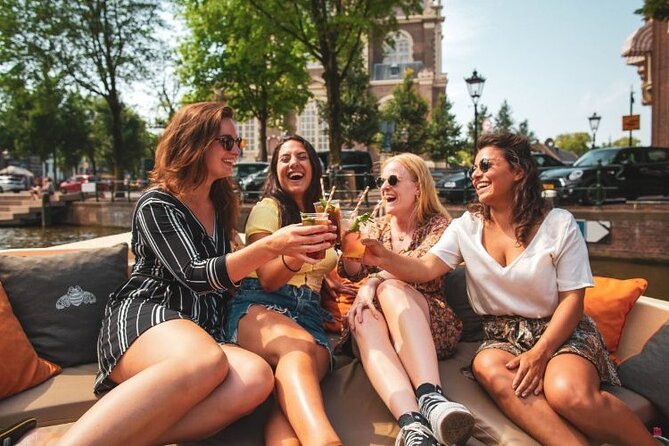 Amsterdam Private Boat Tour with Unlimited Drinks - What the boat ride itself feels like