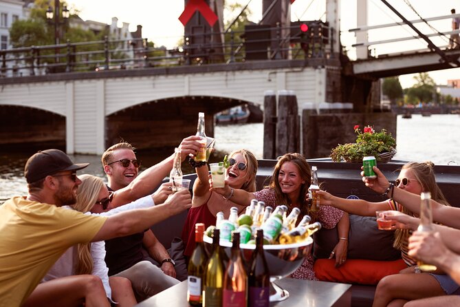 Amsterdam Private Boat Tour with Unlimited Drinks - Oude Kerk and the oldest streets of Amsterdam