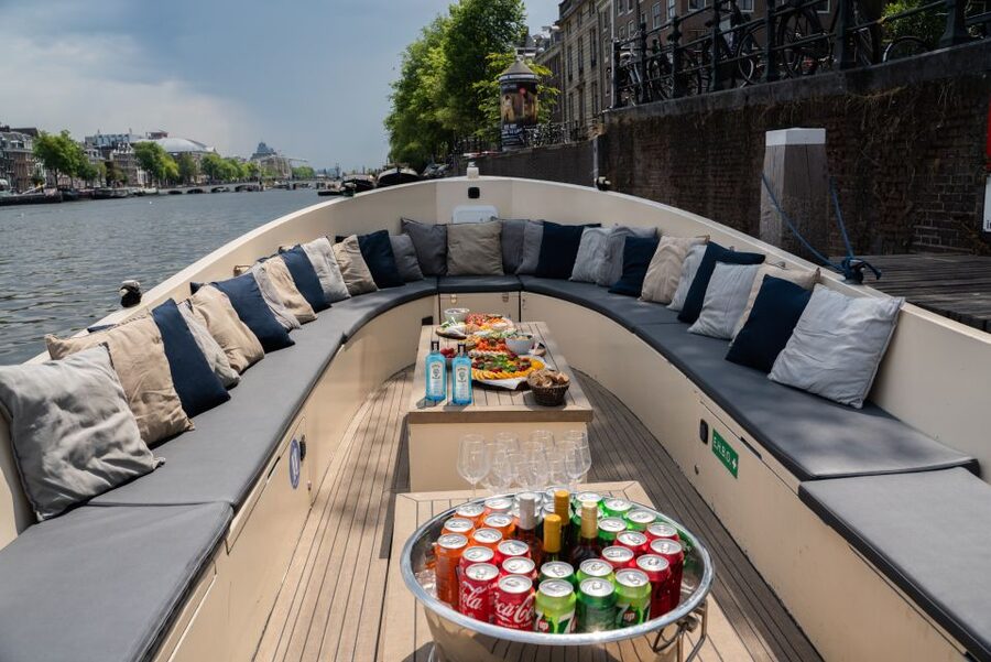 Amsterdam: Private Canal Booze Cruise with Unlimited Drinks - Why a private boat changes the Amsterdam canal experience