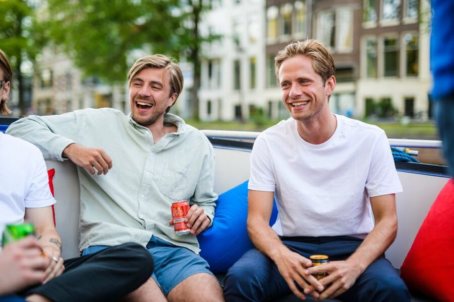 Amsterdam: Private Canal Booze Cruise with Unlimited Drinks - The Red Light District from the water