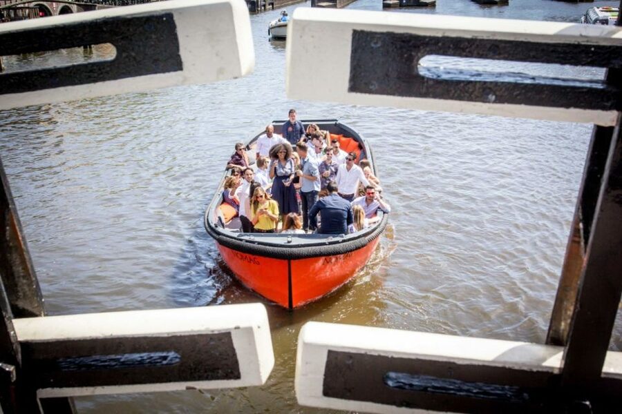 Amsterdam: Private Cruise with Drinks & Pizza or Burger - Rain cover helps, but weather still matters