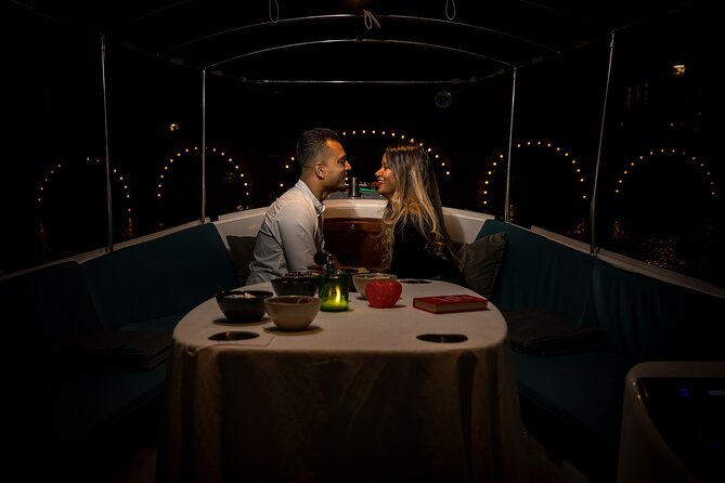 Amsterdam: Private Romantic Evening Canal Cruise + Bubbles/Snacks - Skinny Bridge and Amsterdam’s glowing waterways