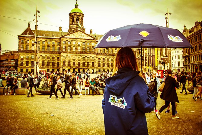 Amsterdam Private Walking Tour - Dam Square: Amsterdam’s grand central stage