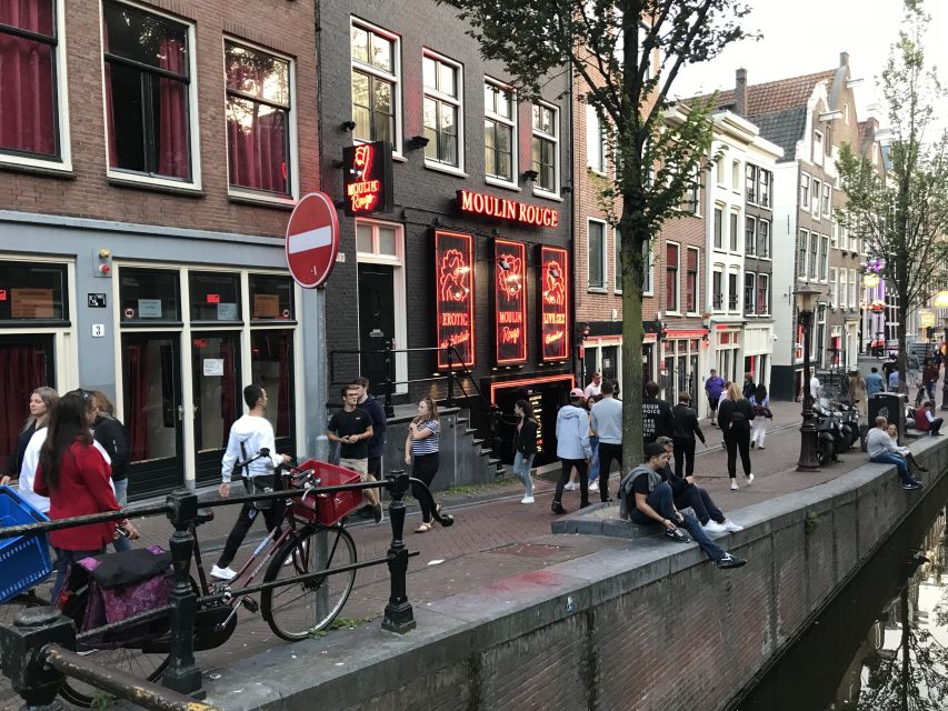 Amsterdam: Red Light District and Local Pub Tour - Oude Kerk and Warmoesstraat: the district’s older face