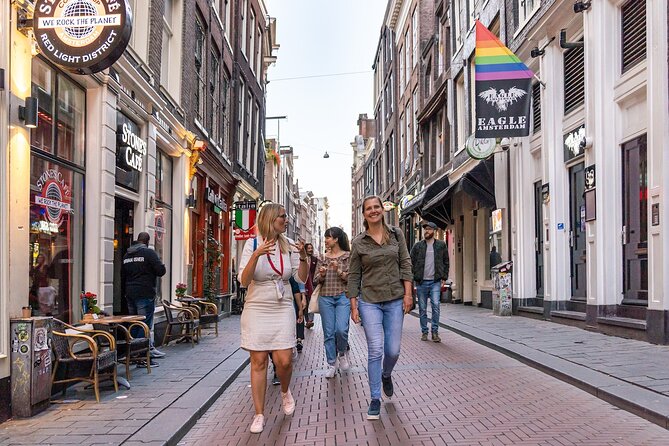 Amsterdam: Red Light District & City Tour (Private tour) - Damrak, the old harbor, and direct answers about sex work