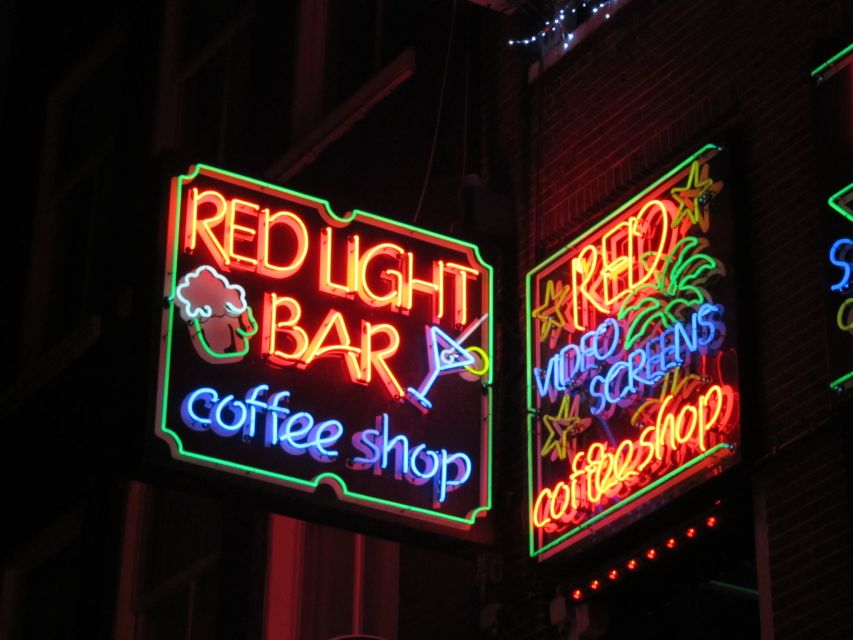 Amsterdam: Red Light District Exclusive Night Tour - Coffee shops, smart shops, and Amsterdam’s liberal image