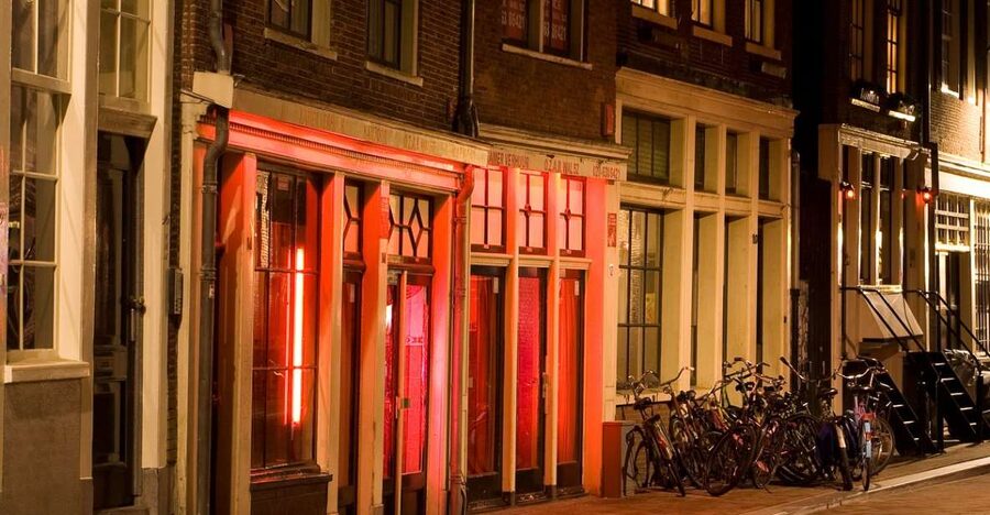 Amsterdam Red Light District tour with a local guide - Reaching the Old Church at the district’s center