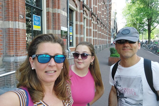 Amsterdam Red Light District Treasure: Self-Guided Tour & Quest - Nieuwmarkt, De Waag, and difficult memories
