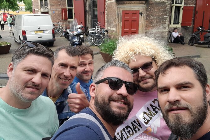 Amsterdam Red Light District Treasure: Self-Guided Tour & Quest - Through the Old Center and toward the Weeping Tower