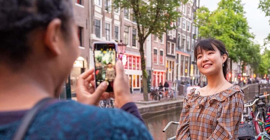Amsterdam: Red Light Tour Exclusive + Peep Show - Dam Square and the changing face of Amsterdam