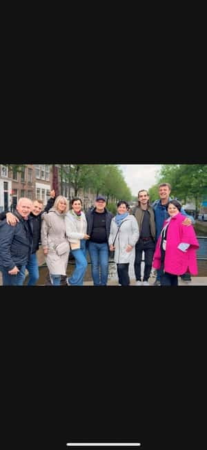 Amsterdam: Red light tour in German/English for groups of 4 people or more - Starting beside St. Nicolas Church