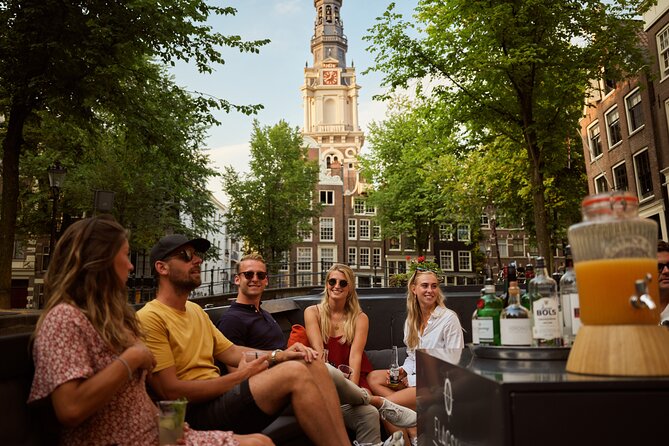 Amsterdam: Saloon Boat Cruise + Unlimited Drinks & Bite option - The Amstel and Amsterdam’s beginnings