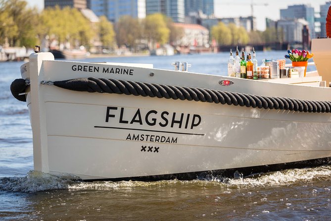 Amsterdam: Saloon Boat Cruise + Unlimited Drinks & Bite option - What the live guide adds
