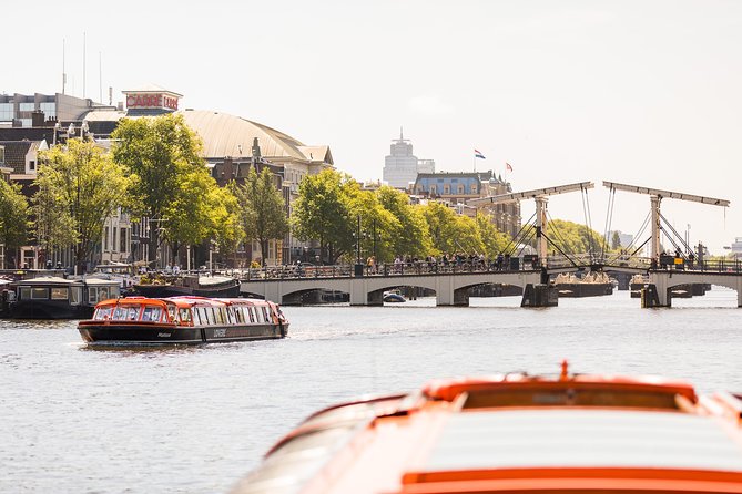 Amsterdam Sightseeing Canal Cruise with Audio Guide - Museums, ships, and modern Amsterdam