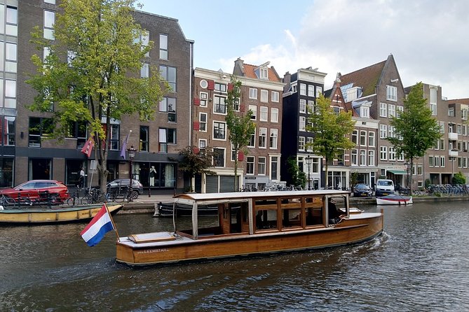 Amsterdam small-group canal cruise in 1920s saloon boat - Starting at Prinsengracht 579