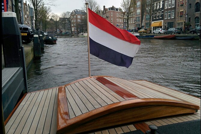 Amsterdam small-group canal cruise in 1920s saloon boat - Commentary that feels like a conversation
