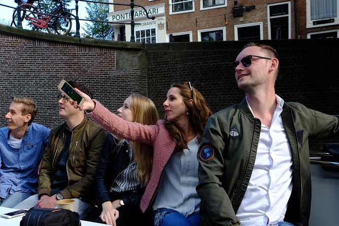 Amsterdam Small-Group Canal Cruise Including Snacks and Drinks - Why a small electric sloop makes a difference