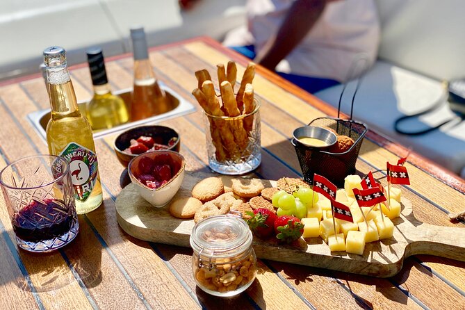 Amsterdam Small-Group Canal Cruise Including Snacks and Drinks - Bitterballen, cheese, and the open bar