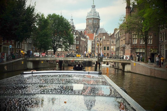 Amsterdam Small-Group Canal Cruise Including Snacks and Drinks - Along the Amstel to the Red Light District
